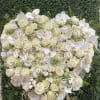 Beautiful white heart shaped arrangement for funeral service. This beautiful heart is