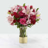 Treat your better half to an arrangement filled with blushing blooms and