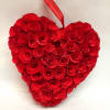 This red decorative heart is made from pencil shavings and lasts a