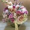 Get a beautiful, fresh medium sized Blomst arrangement of seasonal pastels or
