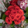 Tall grand arrangement Bright Red roses, pink cymbidium, purple hydrangea, dianthus and