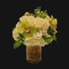Time for winter to end!  Our most popular winter floral design