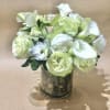 Time for winter to end!  Our most popular winter floral design