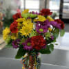 Enjoy the bright colors of spring with this enchanting bouquet!