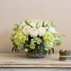This is a elegant high style floral arrangement of garden roses, Hydrangea