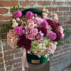 This beautiful arrangement is designed to deliver happiness to a loved ones