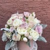 Emily. A soft and pastel look in a pink container. Blossoms of