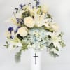 An elegant expression of your deepest condolences, this majestic mix of blue