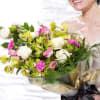 Cymbidium orchids, Roses, Lisianthus and Carnations