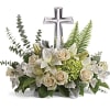This reverant bouquet of serene white flowers is a beautiful sharing of