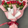 Two dozen roses,any colors,with greenery and baby breath 