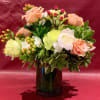 Custom arrangement of white peonies, blush roses, green roses, dianthus &amp; greens