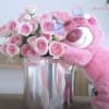 24 pink roses in a beautiful extra large vase and the cutest