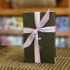 The Signature gift box is filled with 15 of our milk, dark