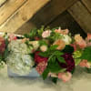 Our Designer&#039;s Choice Seasonal Pastel (Spring) arrangement is soft and sweet. We