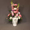 This gorgeous angelic ceramic vase is full of bright and colorful florals.
Colors
