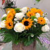 &quot;This bold bouquet of radiant sunflowers and white roses in a hand-crafted