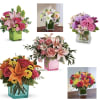 Freshest mix of flowers beautifully arranged in a 4.5-5&rdquo; clear or colored