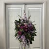 Console and comfort with this luxurious spray of lavender roses alstroemeria and