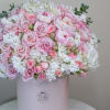 An incredibly soft and delicate combination of pink peonies, roses,  hydrangeas