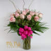 Send love with one dozen premium pink roses or any color roses