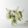 There&#039;s nothing plain about this beautiful bouquet. Filled with white roses, hydrangeas
