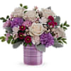 Cr&egrave;me roses, purple carnations, miniature light pink carnations, lavender cushion spray chrysanthemums