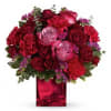 Pure passion. Bedazzle your beloved with luscious red and lavender roses in