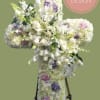 A pastel sympathy cross is a touching tribute to a life of