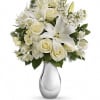 The gorgeous bouquet includes white roses, white spray roses, white oriental lilies