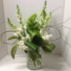 A beautiful floral arrangement with mixed flowers.

Flower selection subject to availability.