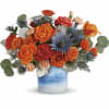 One of a kind! This standout mix of bold orange roses and