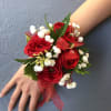 Choose classic red spray roses with baby&#039;s breath and mixed foliage that