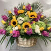 This traditional funeral basket is beautiful. Arranged in a wicker basket it