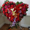 All roses, carnations and orchids &quot;Bleeding heart&quot; standing spray made of mixed