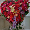 All roses, carnations and orchids &quot;Bleeding heart&quot; standing spray made of mixed