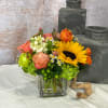 Let Sparks fly with this arrangement.&nbsp;Sparks features sunflowers, green hydrangea, tulips, chamomile