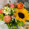 Let Sparks fly with this arrangement.&nbsp;Sparks features sunflowers, green hydrangea, tulips, chamomile