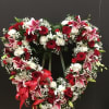 This standing open heart is make with red and white color flowers