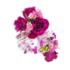 A fun wrist corsage created from a coil of beads and decorative