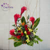 Birds of paradise, Hawaiian ginger flowers, ornamental kale, roses, and orchids appeared