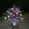 Wildflower inspired floral tribute basket in lovely lavender, indigo and purple tones