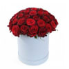 Beautiful red roses in a hat box.  Perfect gift for your