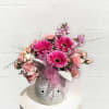 A pretty design with pink and white fresh flowers in a cute