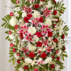 Red &amp; White Sympathy Standing Spray
Celebrate a beautiful life with a truly