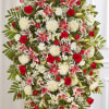 Red &amp; White Sympathy Standing Spray
Celebrate a beautiful life with a truly