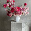 A pink mixed flower arrangement can be a stunning and eye-catching display