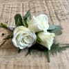 You&#039;ll be the picture of style with this classy boutonniere of white