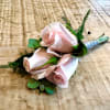 You&#039;ll be the definition of style with this mini garden rose boutonniere.