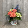 Beautiful arrangement in a ceramic mug saying Make Today Amazing. 